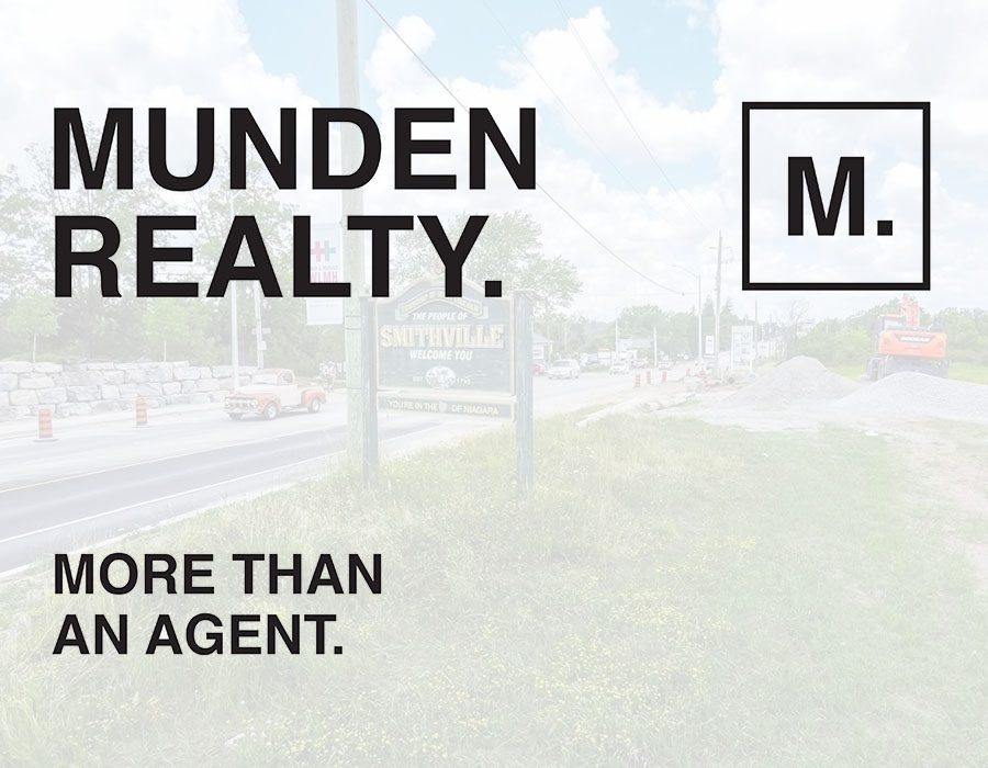 A banner that says munden realty.