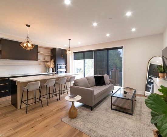 A living room with a couch and table in it