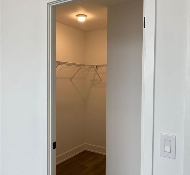 A view of the closet from inside a room.